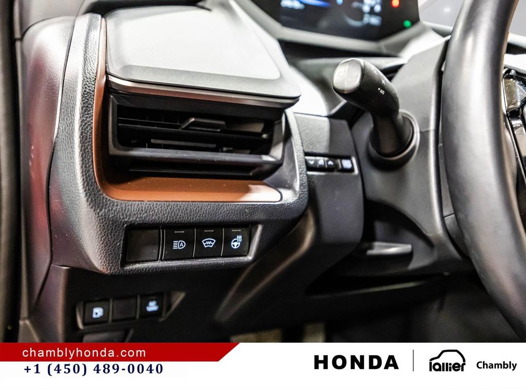 2024 Toyota Prius Prime SE  I CARPLAY I MAGS I HEATED SEATS I CAMERA I ACTIVE SECURITY in Montréal, Quebec - 21 - w1024h768px