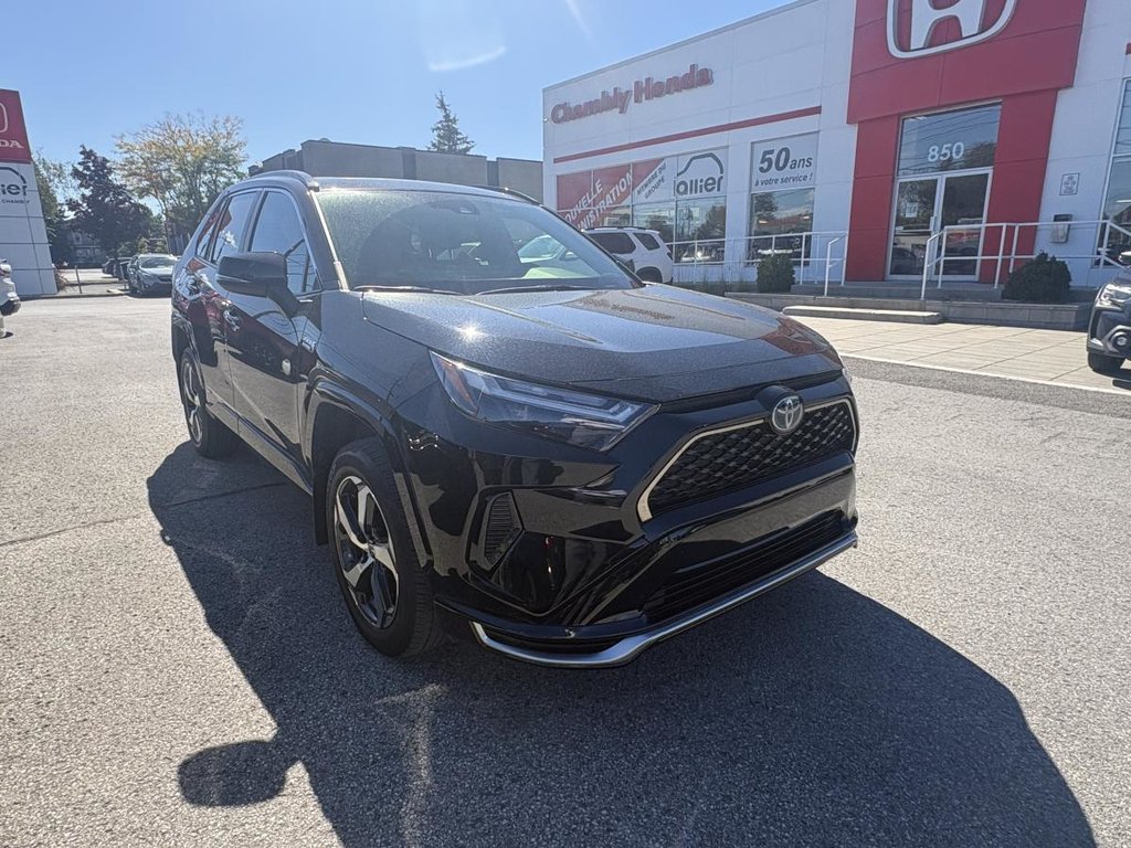 2024 Toyota RAV4 Prime SE AWD  SUNROOD I MAGS I CARPLAY I HEATED SEATS I CAMERA I ACTIVE SECURITY in Montréal, Quebec - 1 - w1024h768px