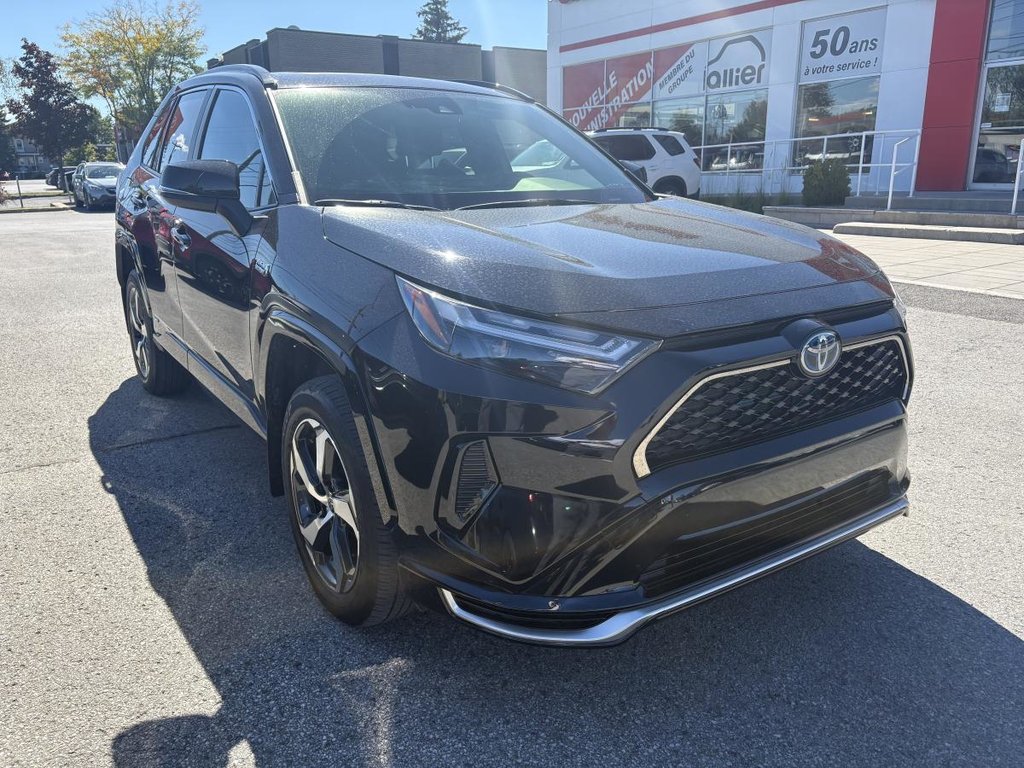 2024 Toyota RAV4 Prime SE AWD  SUNROOD I MAGS I CARPLAY I HEATED SEATS I CAMERA I ACTIVE SECURITY in Montréal, Quebec - 3 - w1024h768px