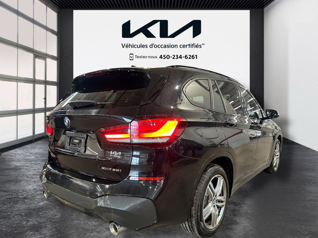 2020 BMW X1 XDrive28i, JAMAIS ACCIDENTÉ, 8 PNEUS ET 8 MAGS in Mirabel, Quebec - 33 - w1024h768px
