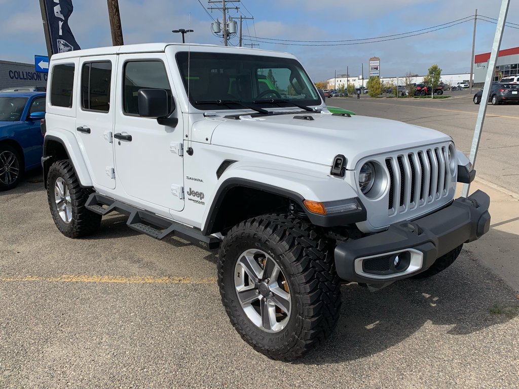 Triple Seven Chrysler | 2019 Jeep Wrangler Unlimited SAHARA | #210759