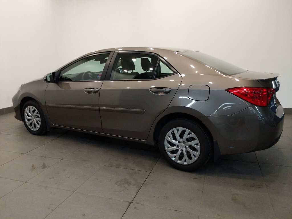 Hyundai of Regina | 2017 Toyota Corolla 4-door Sedan SE CVTi-S Rear View Camera | #4J0091A