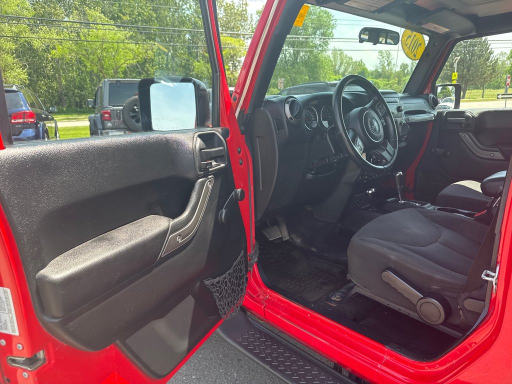 2015 Jeep Wrangler Unlimited Sport in Sussex, New Brunswick - 14 - w1024h768px