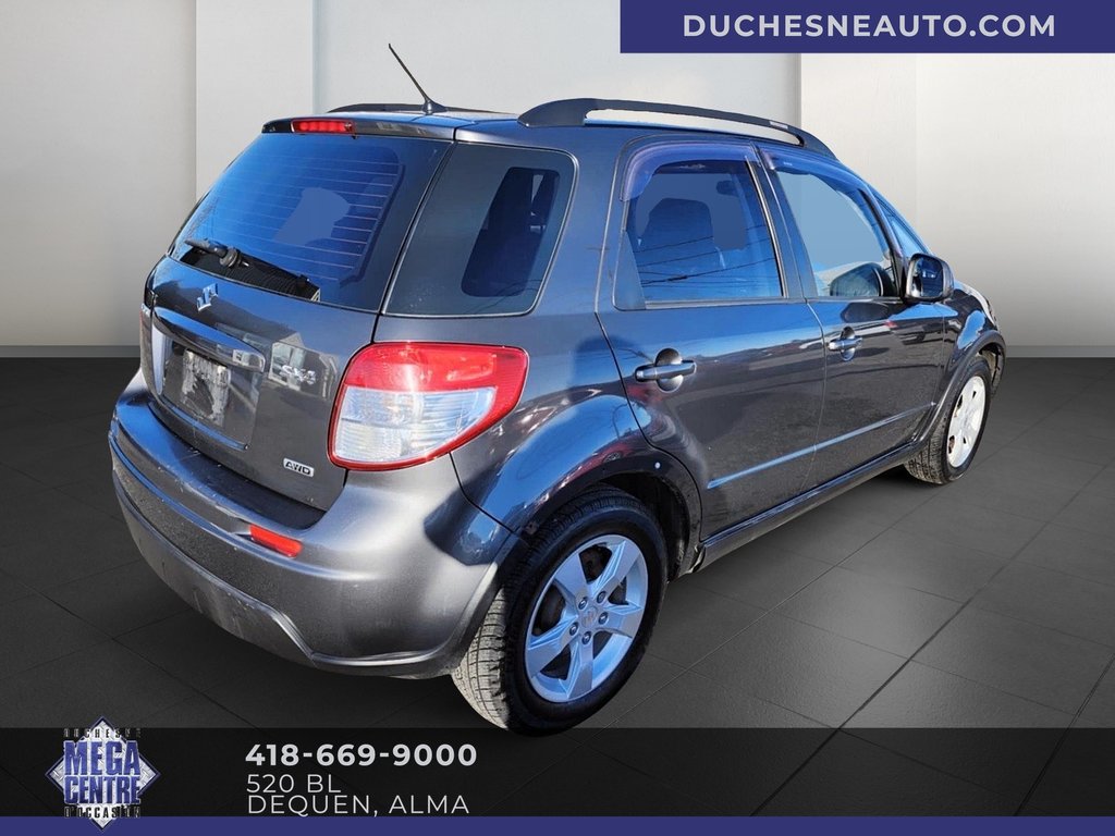 SX4 Fastback JX 2010 à Alma, Québec - 3 - w1024h768px