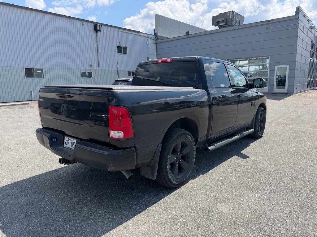 2021 Ram 1500 Classic SLT in Sherbrooke, Quebec - 4 - w1024h768px