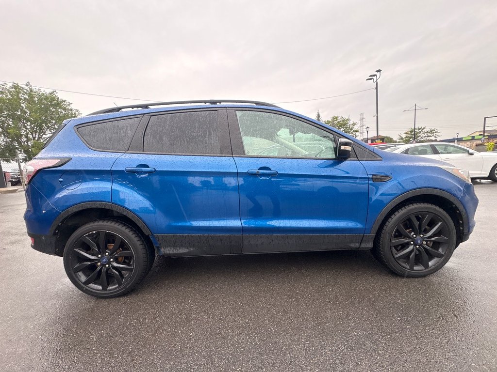 2018 Ford Escape Titanium in Pointe-Aux-Trembles, Quebec - 10 - w1024h768px