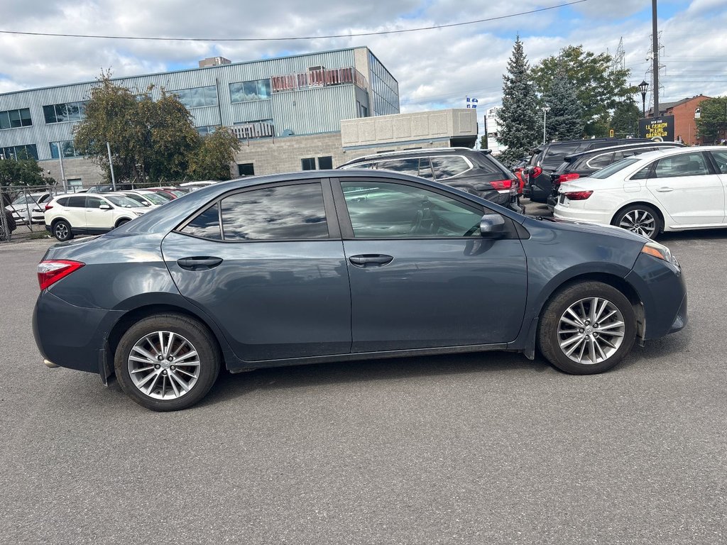 2014 Toyota Corolla LE in Pointe-Aux-Trembles, Quebec - 12 - w1024h768px