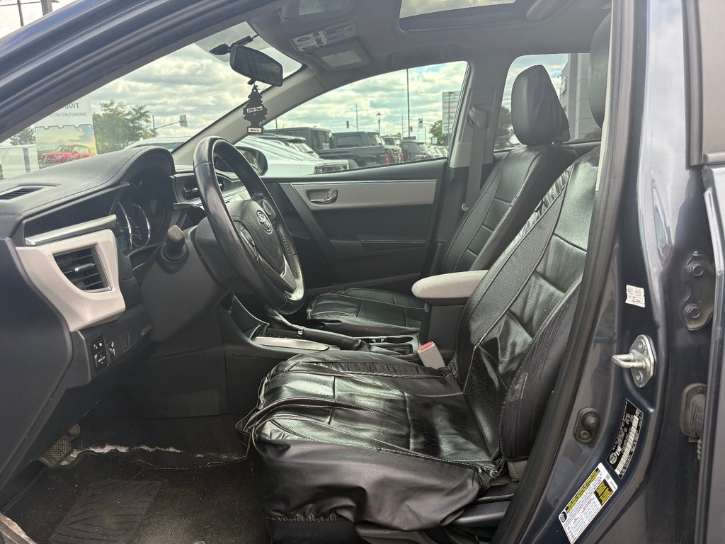 2014 Toyota Corolla LE in Pointe-Aux-Trembles, Quebec - 16 - w1024h768px