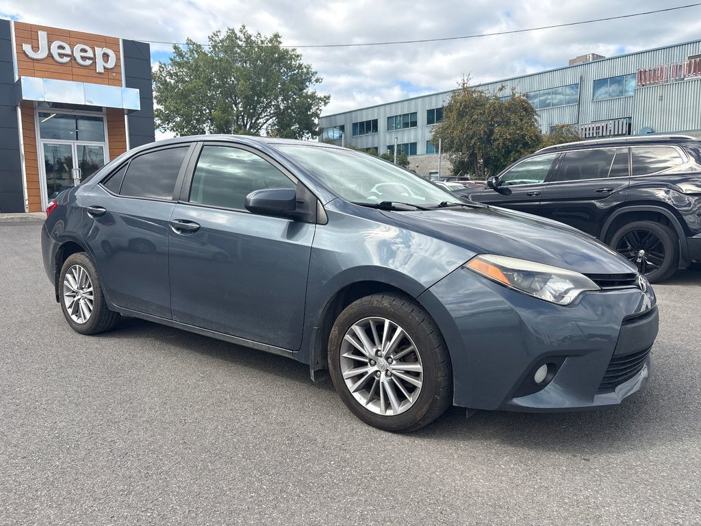 2014 Toyota Corolla LE in Pointe-Aux-Trembles, Quebec - 5 - w1024h768px