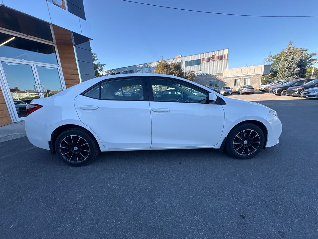 2016 Toyota Corolla in Pointe-Aux-Trembles, Quebec - 6 - w1024h768px