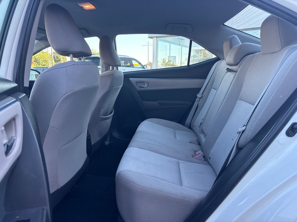 2016 Toyota Corolla in Pointe-Aux-Trembles, Quebec - 17 - w1024h768px