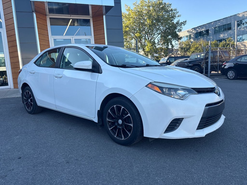 2016 Toyota Corolla in Pointe-Aux-Trembles, Quebec - 3 - w1024h768px