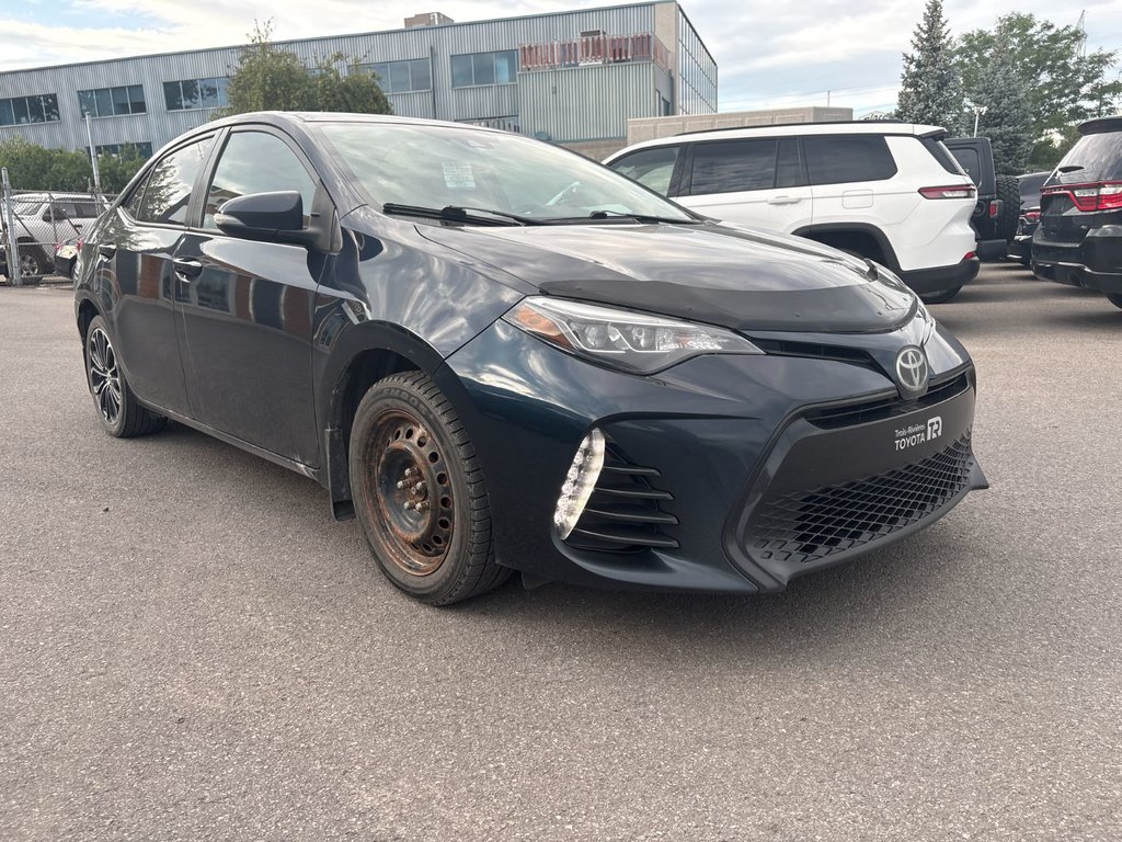 2017 Toyota Corolla LE in Pointe-Aux-Trembles, Quebec - 3 - w1024h768px