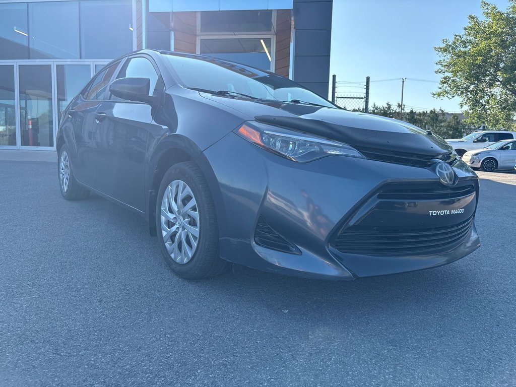 2018 Toyota Corolla LE in Pointe-Aux-Trembles, Quebec - 5 - w1024h768px