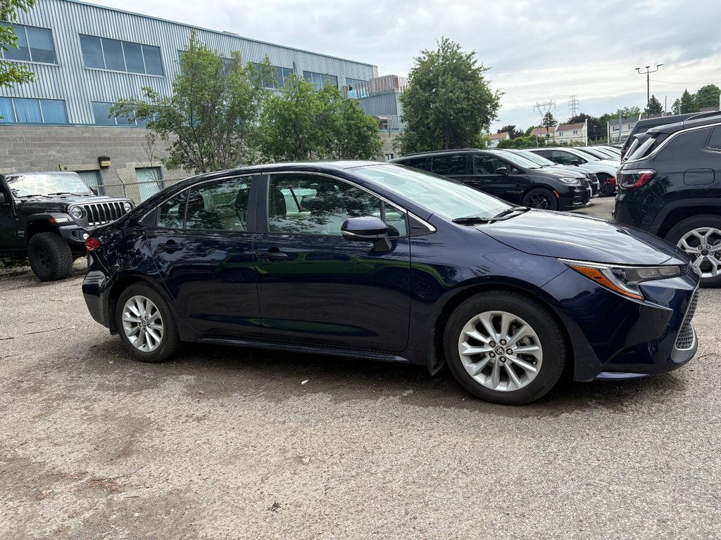2022 Toyota Corolla XLE in Pointe-Aux-Trembles, Quebec - 2 - w1024h768px