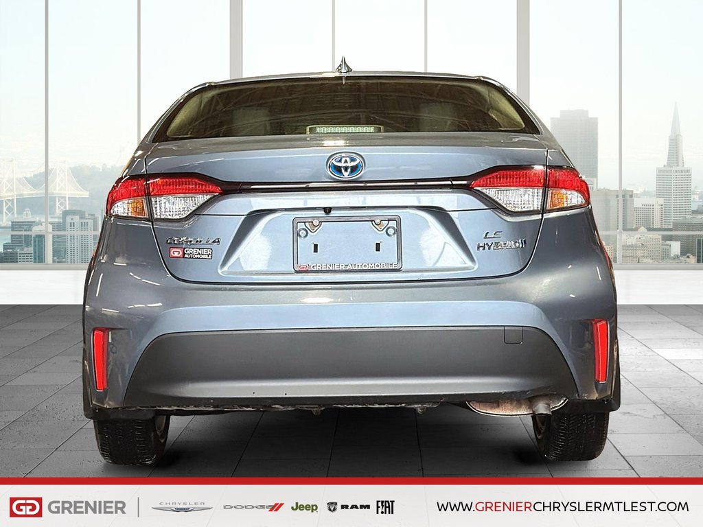 Toyota Corolla HYBRID LE + SIEGES CHAUFFANTS + CARPLAY 2023 à Pointe-Aux-Trembles, Québec - 3 - w1024h768px