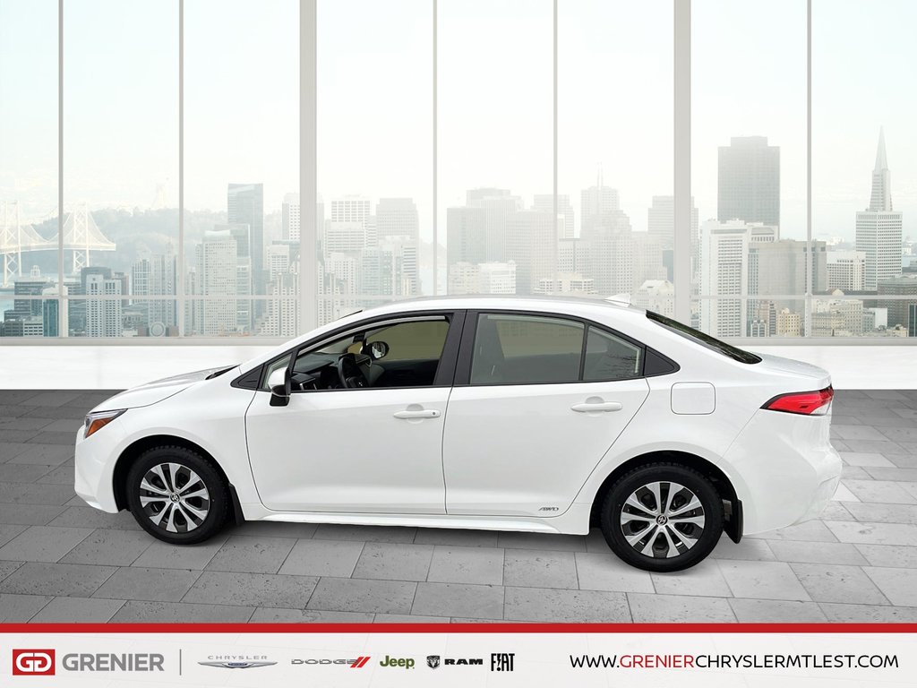 Toyota Corolla LE + HYBRIDE + AWD 2024 à Pointe-Aux-Trembles, Québec - 7 - w1024h768px