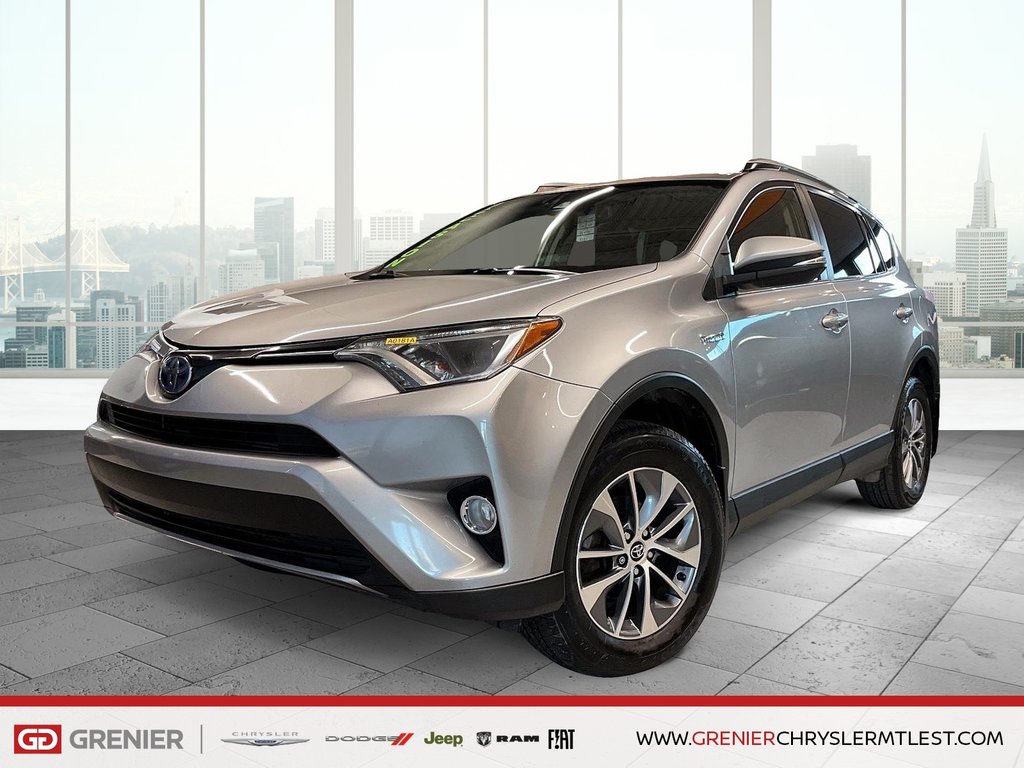 Toyota RAV4 HYBRIDE LE+ AWD + TOIT OUVRANT 2018 à Pointe-Aux-Trembles, Québec - 1 - w1024h768px