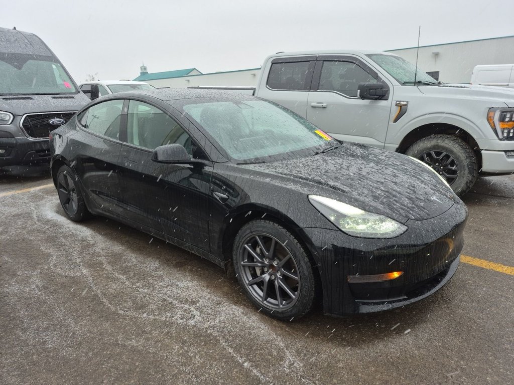 Tesla Model 3 Standard Range Plus 2021 à Terrebonne, Québec - 1 - w1024h768px