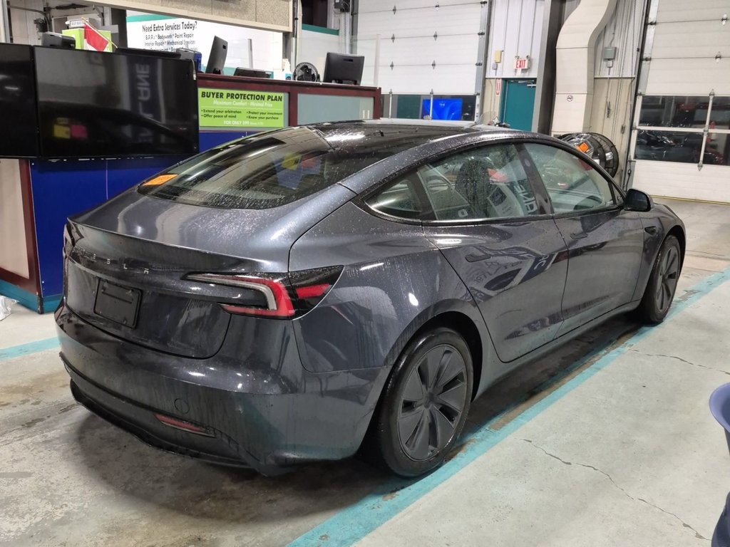 2024 Tesla Model 3 Long Range AWD in Terrebonne, Quebec - 1 - w1024h768px