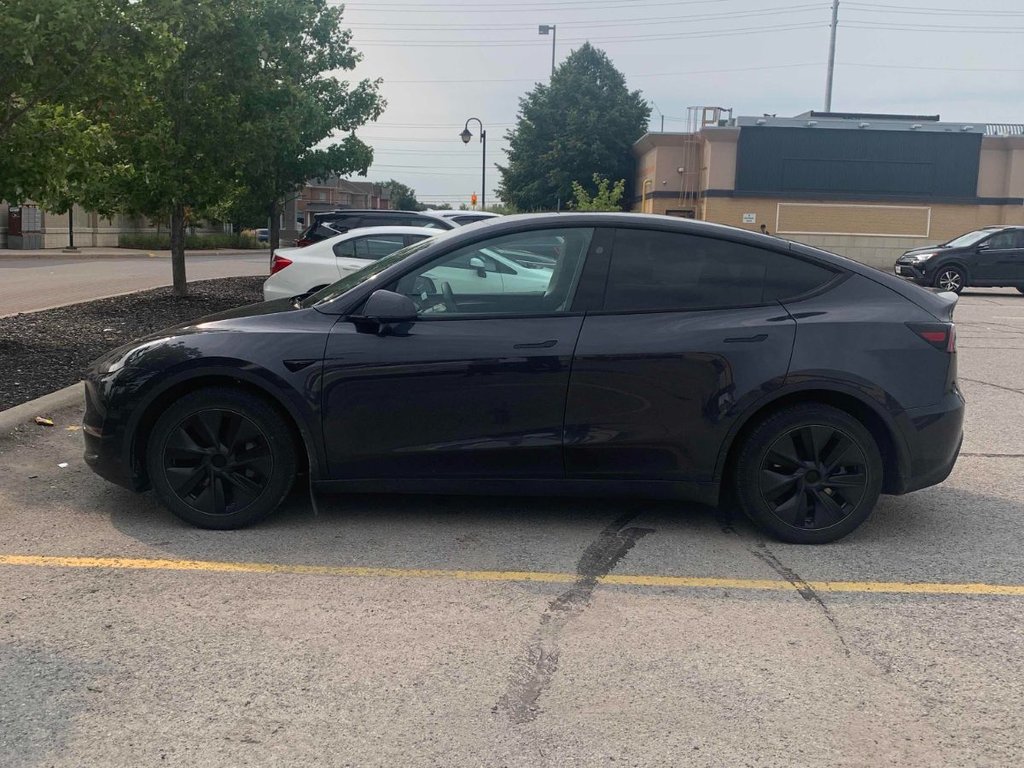 2024 Tesla Model Y Long Range in Terrebonne, Quebec - 1 - w1024h768px