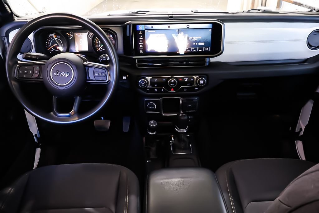 2024 Jeep Wrangler 4 PORTES SPORT + 4X4 + TOIT RIGIDE in Terrebonne, Quebec - 10 - w1024h768px