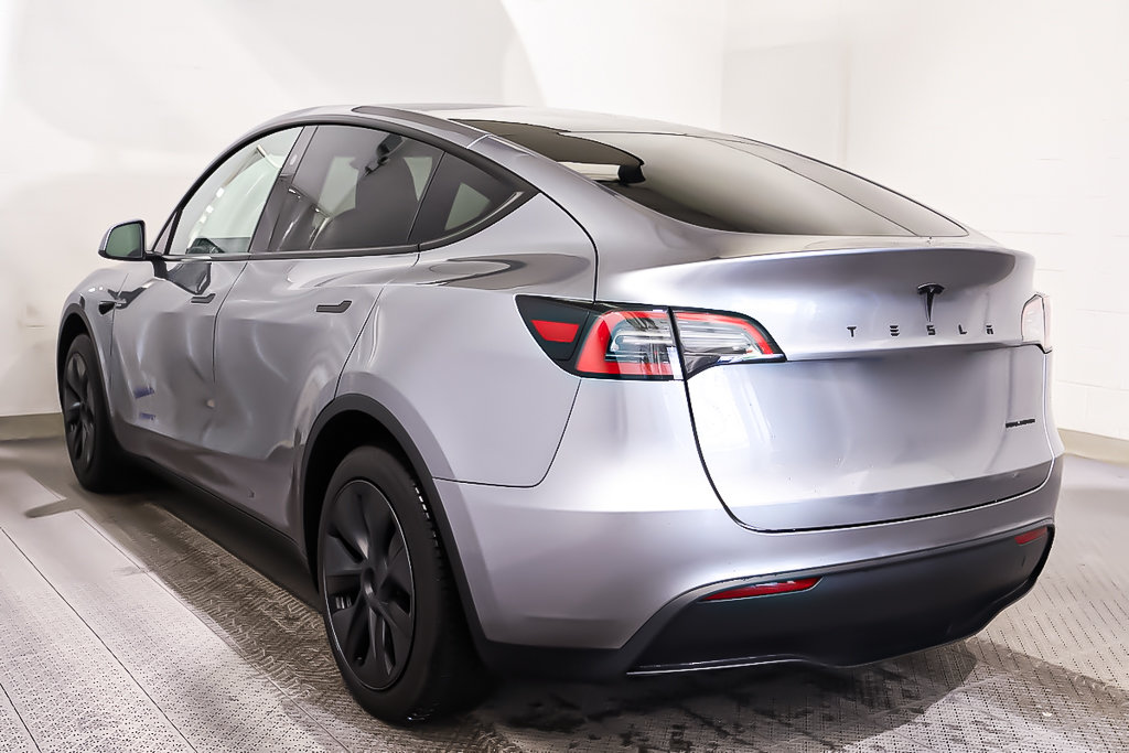 2024 Tesla Model Y SR + ELECTRIQUE + CUIR + TOIT DE VERRE PANO in Terrebonne, Quebec - 30 - w1024h768px