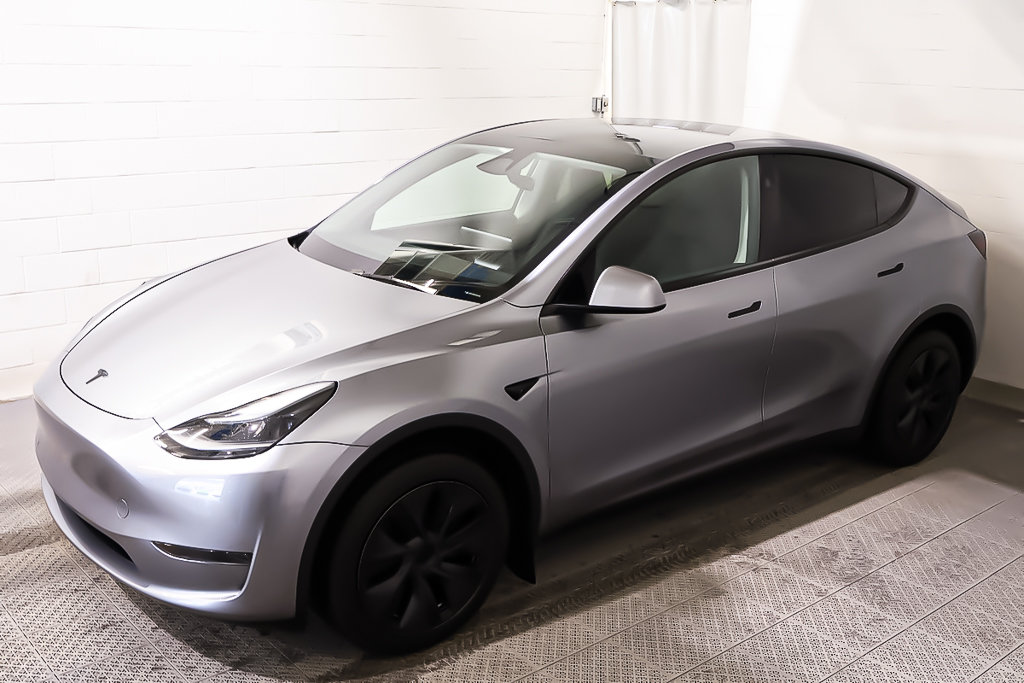 2024 Tesla Model Y SR + ELECTRIQUE + CUIR + TOIT DE VERRE PANO in Terrebonne, Quebec - 9 - w1024h768px