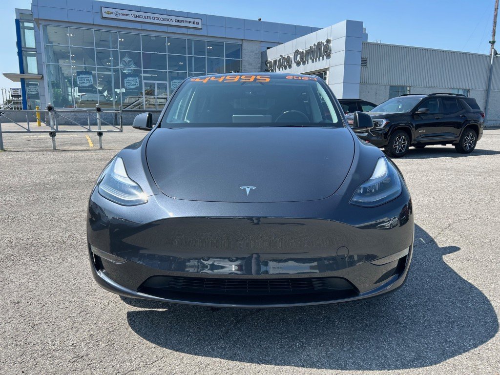 2024 Tesla Model Y in Montreal, Quebec - 2 - w1024h768px