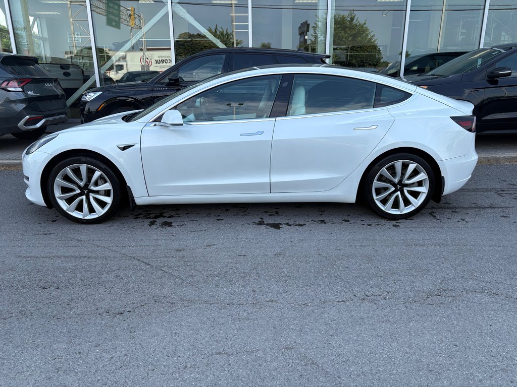 2020 Tesla Model 3 in Brossard, Quebec - 5 - w1024h768px
