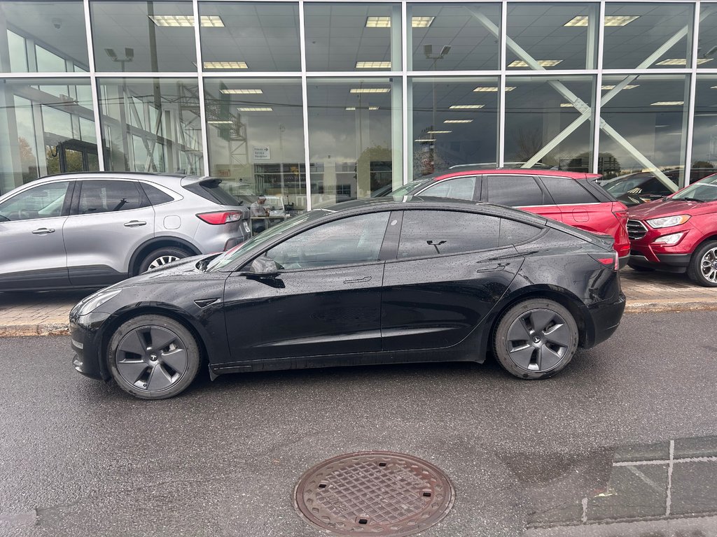 2023 Tesla Model 3 in Brossard, Quebec - 5 - w1024h768px