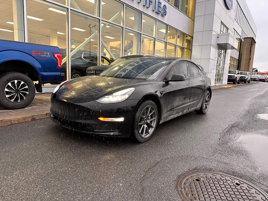 2023 Tesla Model 3 in Brossard, Quebec - 1 - w1024h768px