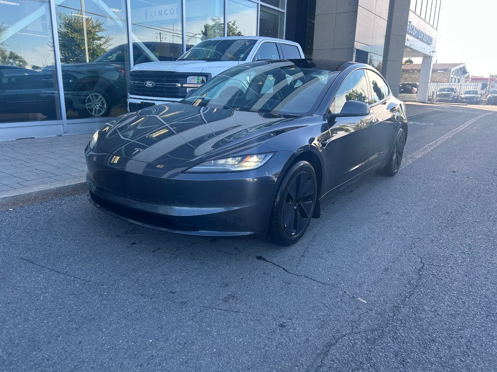 2024 Tesla Model 3 in Brossard, Quebec - 1 - w1024h768px