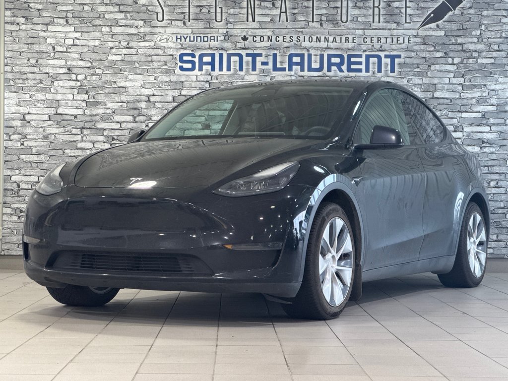2023 Tesla Model Y STANDARD RANGE RWD CUIR TOIT PANO CAMERA in Montréal, Quebec - 1 - w1024h768px