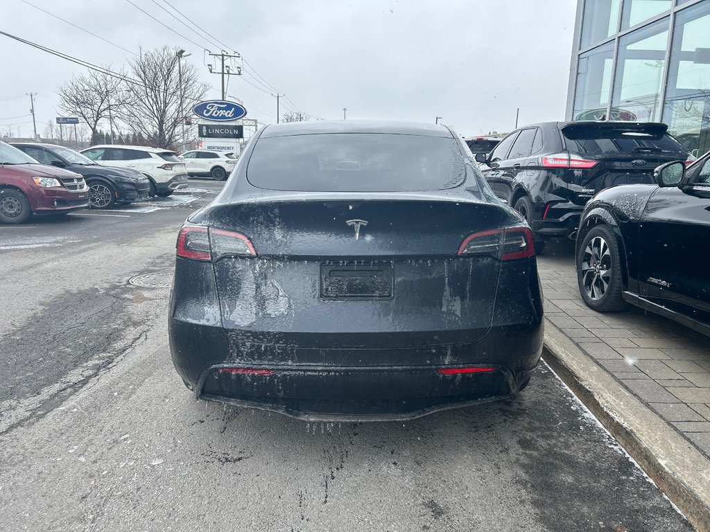 2025 Tesla Model Y in Brossard, Quebec - 9 - w1024h768px