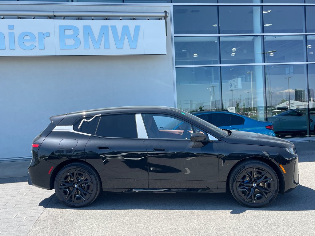2026 BMW IX XDrive60 in Terrebonne, Quebec - 3 - w1024h768px