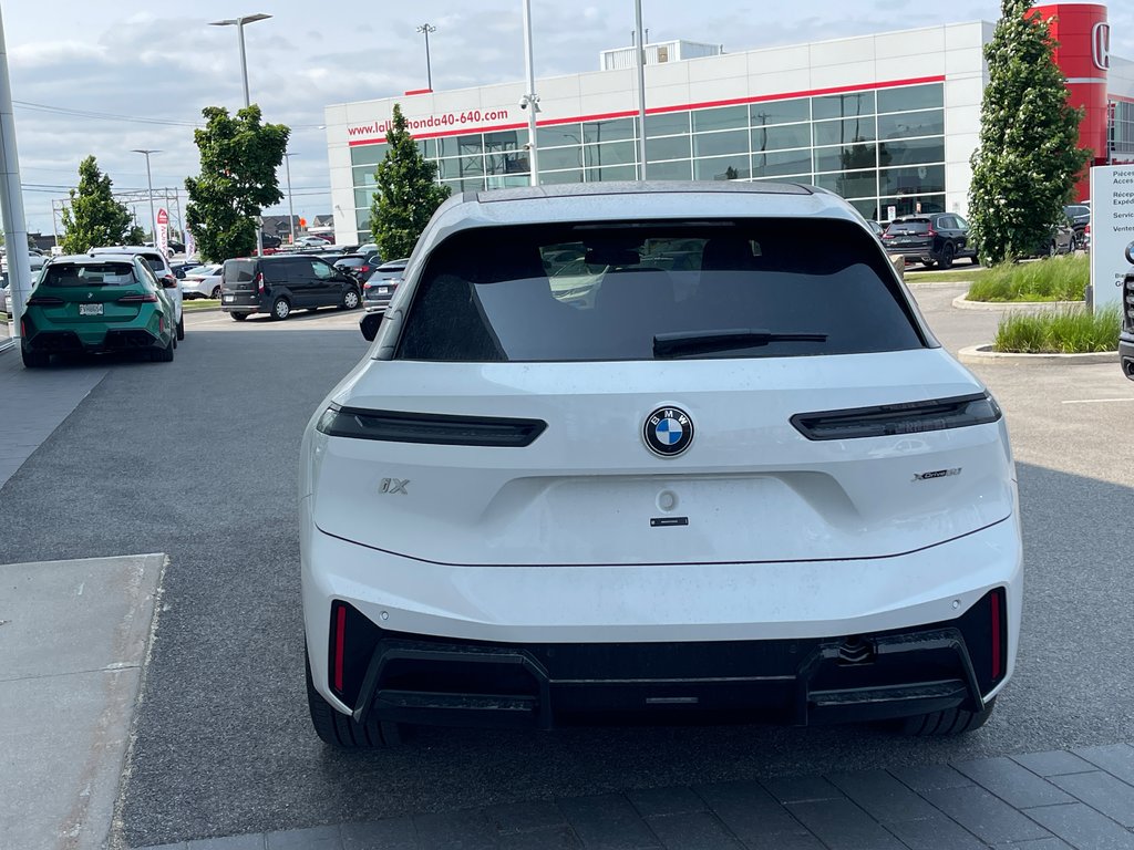 2026 BMW IX XDrive60 in Terrebonne, Quebec - 5 - w1024h768px