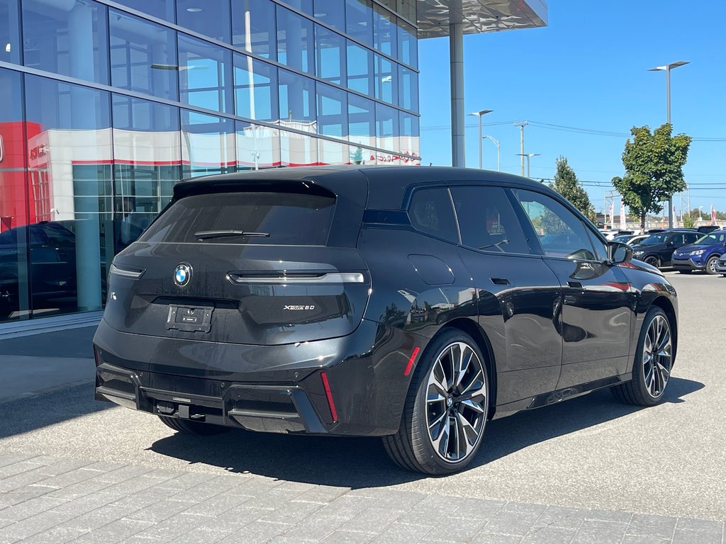 2026 BMW IX XDrive60 in Terrebonne, Quebec - 4 - w1024h768px