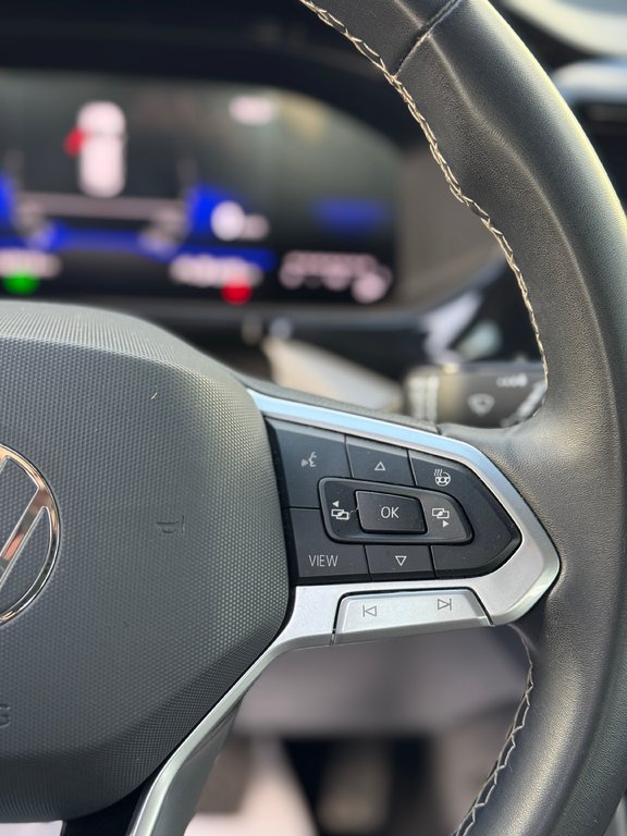 2024 Volkswagen Taos Trendline  Cam.Rec Sieg.Chauff Mag Air.Clim in Terrebonne, Quebec - 12 - w1024h768px