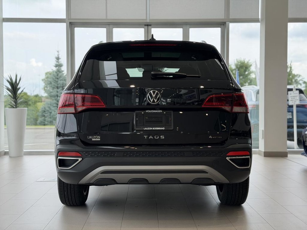2023 Volkswagen Taos Comfortline 4MOTION | DÉMARREUR | TOIT PANO | CUIR | CARPLAY | CAMÉRA +++ in Laval, Quebec - 7 - w1024h768px