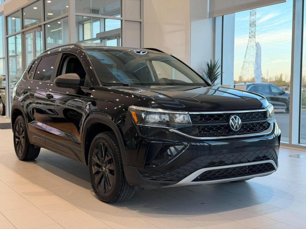Volkswagen Taos Trendline | CARPLAY | CAMÉRA | SIÈGES & VOLANT CHAUFFANTS +++ 2023 à Laval, Québec - 1 - w1024h768px