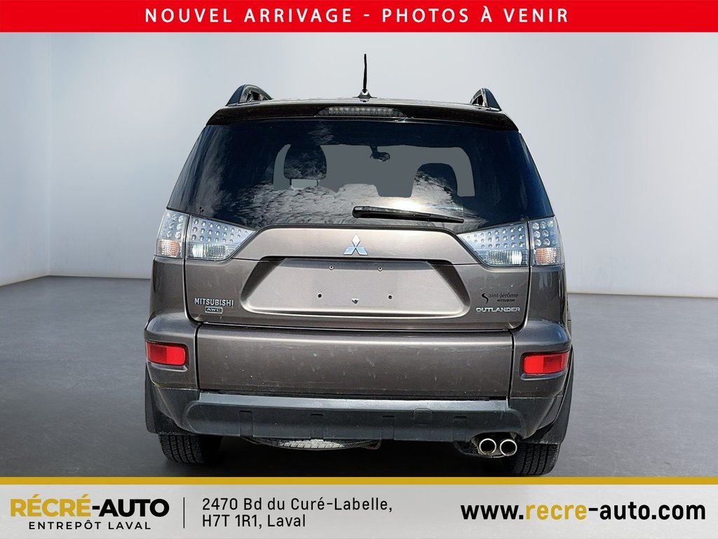 2011  Outlander 4WD LS + BANCS CHAUFFANTS + TEL QUEL!!! in Brossard, Quebec - 3 - w1024h768px