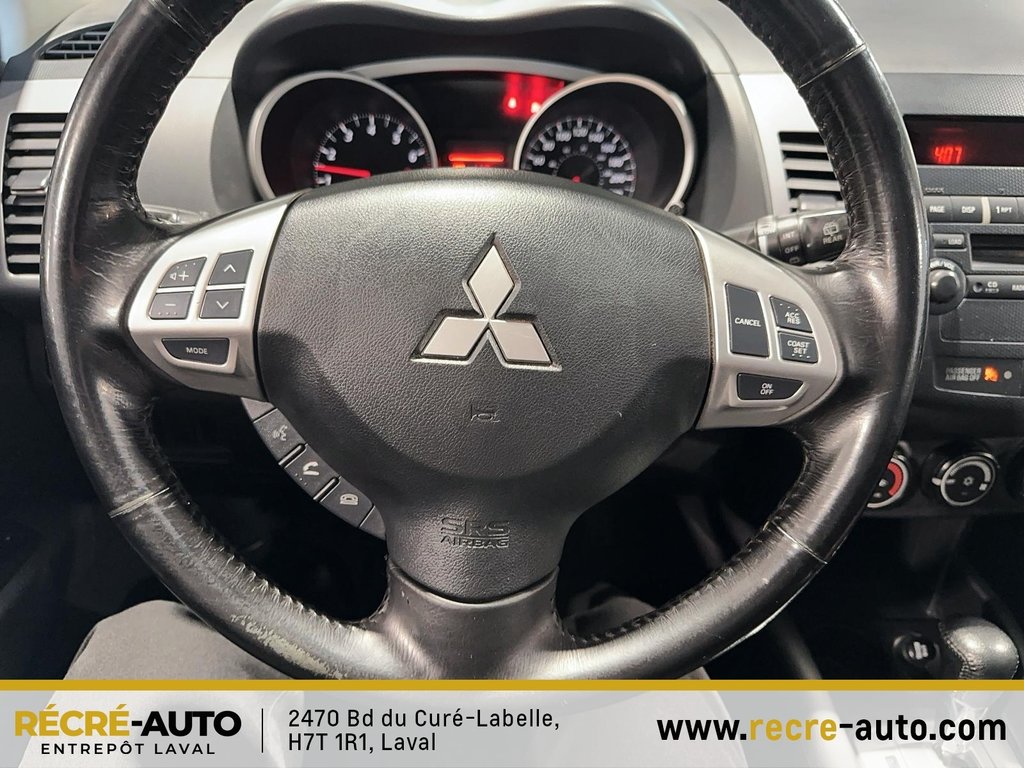 2011  Outlander 4WD LS + BANCS CHAUFFANTS + TEL QUEL!!! in Brossard, Quebec - 14 - w1024h768px