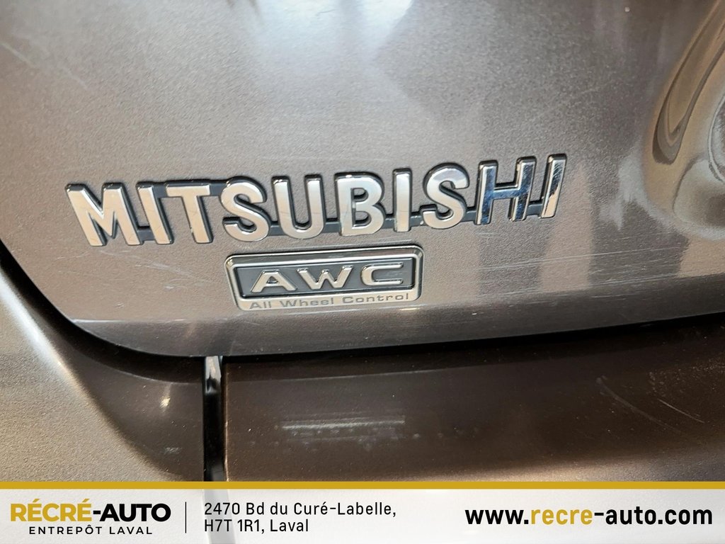 Outlander 4WD LS + BANCS CHAUFFANTS + TEL QUEL!!! 2011 à Brossard, Québec - 9 - w1024h768px