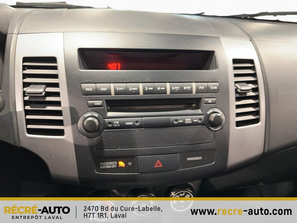 Outlander 4WD LS + BANCS CHAUFFANTS + TEL QUEL!!! 2011 à Brossard, Québec - 22 - w1024h768px