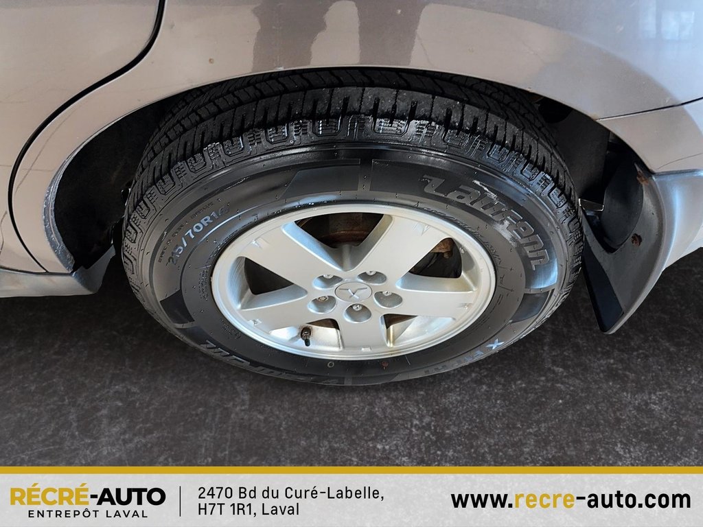 Outlander 4WD LS + BANCS CHAUFFANTS + TEL QUEL!!! 2011 à Brossard, Québec - 7 - w1024h768px