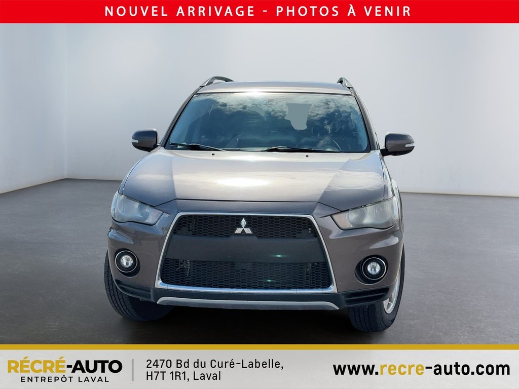 Outlander 4WD LS + BANCS CHAUFFANTS + TEL QUEL!!! 2011 à Brossard, Québec - 2 - w1024h768px