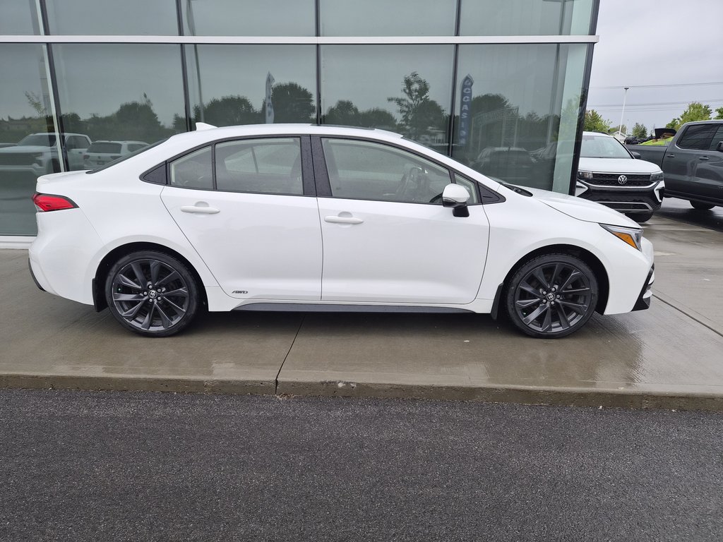 Toyota Corolla SE HYBRID TI 2023 à Charlemagne, Québec - 2 - w1024h768px