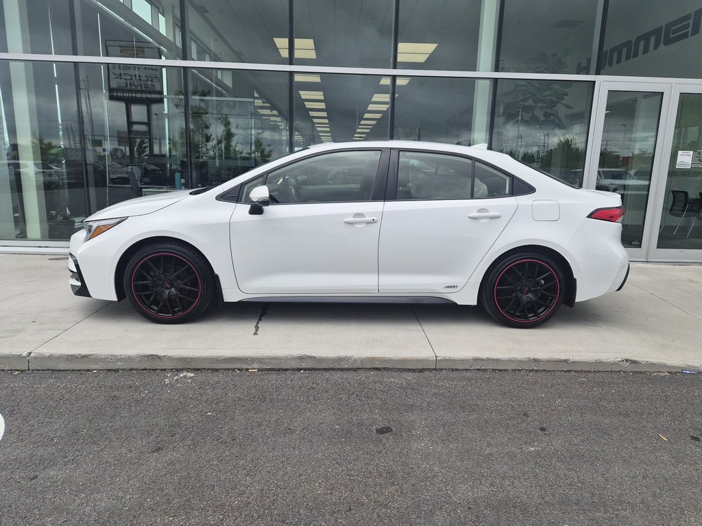 2023 Toyota Corolla SE HYBRID TI in Saint-Jérôme, Quebec - 4 - w1024h768px