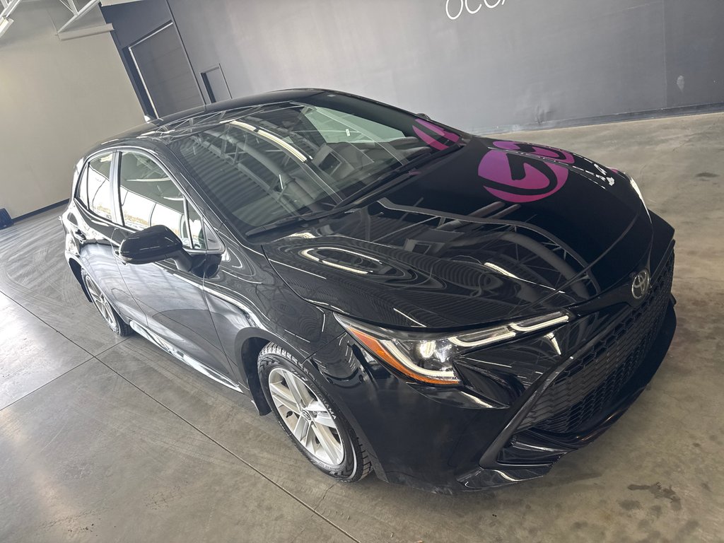 2022 Toyota Corolla Hatchback SE in Saint-Jean-Sur-Richelieu, Quebec - 2 - w1024h768px